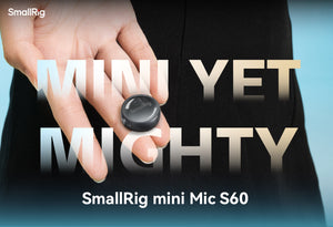 Hand holding a SmallRig mini Mic S60 with text 'Mini Yet Mighty' on a blurred background
